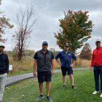 Group of alumni on golf course